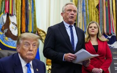 Trump signs executive order to cut childhood vaccines recommendations, drawing medical concern